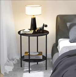 Black round side table