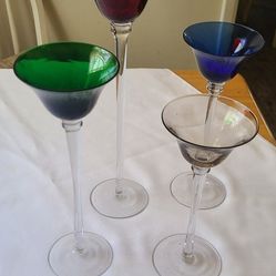 4 Graduated Clear Long Stemmed Tea Light Candle. 