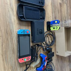 Nintendo Switch with case and joycons