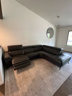L shape leather couch with reclining seat
