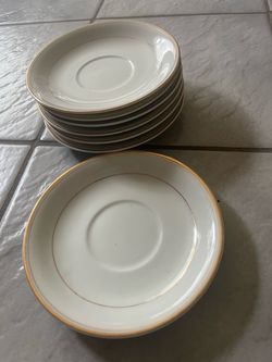 Set of Off-White Saucers with Gold Trim, 6”round