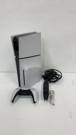 Sony PS5 slim disc version with controllers, chords and controller, charging dock