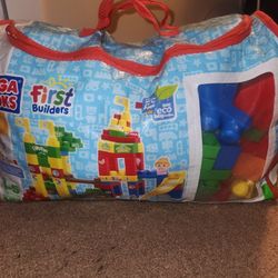 Mega Bloks ( 100 Plus Bloks With Wheelbarrow) 