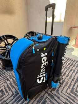 Used SLINGER TENNIS TRAINER ($685)
