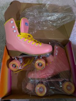 {Pink} ROLLER SKATES