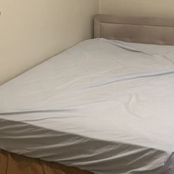 Full size mattress along with queen size frame