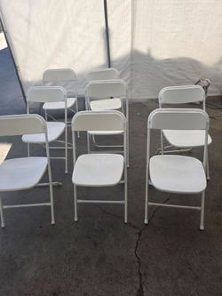 12 White plastic chairs $108