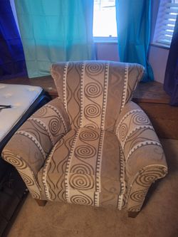Upholstered Accent Chair with Swirl Pattern