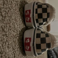 black and white checkered board slip-on vans