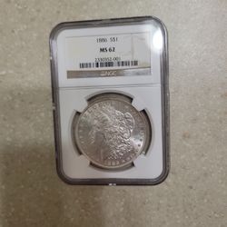 1886 Morgan Silver Dollar.  Graded 