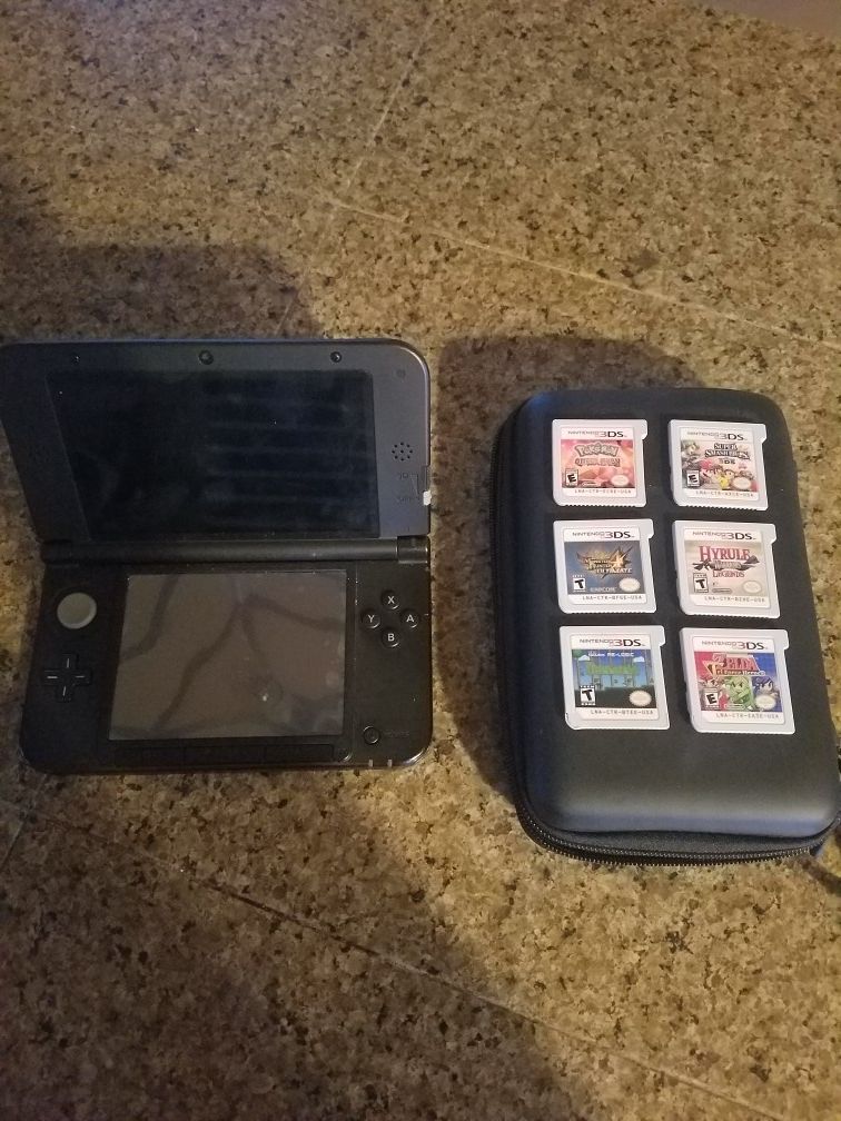 Nintendo 3DS XL with 6 games