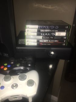 Xbox 360 with 2 controllers and games
