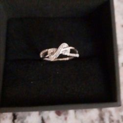 New Never Worn Have 2 Left Size 5 1/20 CT. T.W. Diamond Infinity Ring in Sterling Silver   Comes W/box From Zales Pick Up Only  Fall River Ma