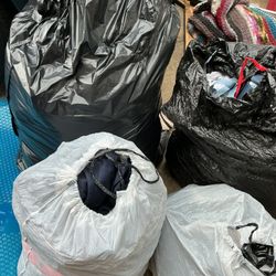 Four Bags Of Different Size, Style For Men , Women , And Children, A Lot Of Jeans ( All For $60) It’s A Lot