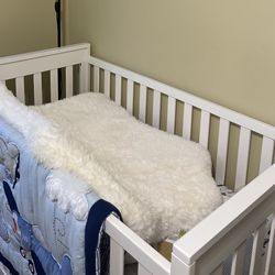 White baby crib