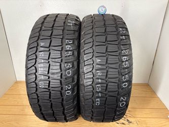 2 tires 265 50 20 uniroyal laredo at like new no repairs