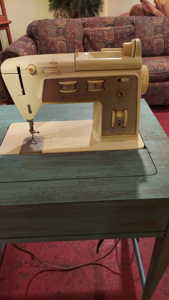 Singer sewing machine oak cabinet