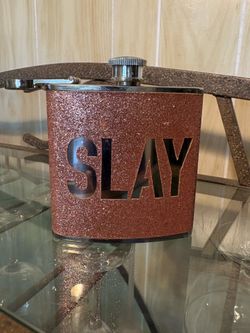 “Slay” liquor flask