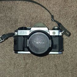 AE-1 CANON PROGRAM CAMERA IN EXCELLENT CONDITION. ASKING $260 OR BEST OFFER. 