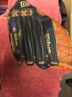 Left hand tee ball glove