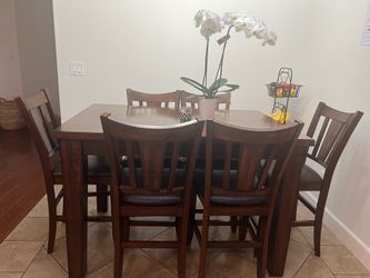 Height counter table with 8 chairs
