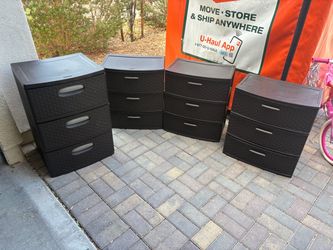 Brown plastic storage drawers