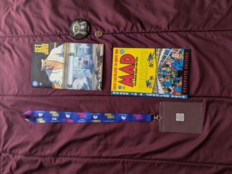 Comic Con Lanyard, Pins, and Comics