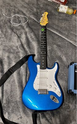 Blue Electric Guitar Stratocaster Style