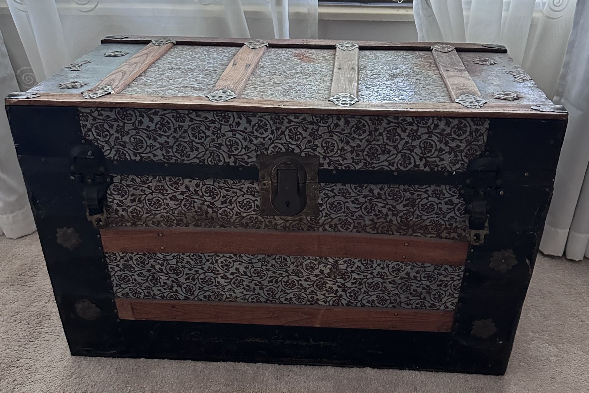 ANTIQUE VICTORIAN BLACK & WHITE FLORAL EMBOSSED TIN TRUNK