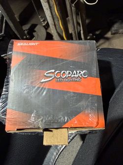Sealight Scoparc 9005/HB3 LED Headlight Bulbs  New Sealight Scoparc LED lighting kit includes two 9005/HB3 bulbs. These silver and black automotive bu