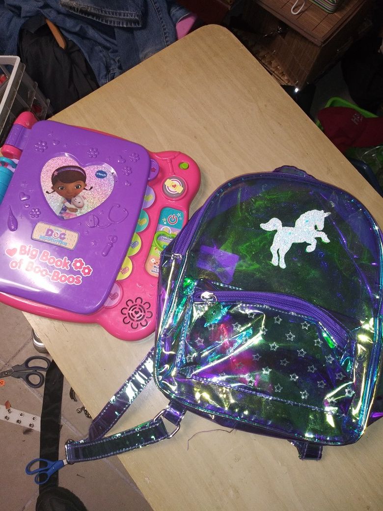 Kids backpack and toy book