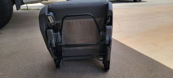 2 New all leather bucket seats.