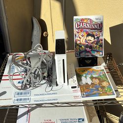 Nintendo Wii console game Q compatible comes with two games, carnival games and Crayola color for journey Nintendo Wii console game Q compatible comes