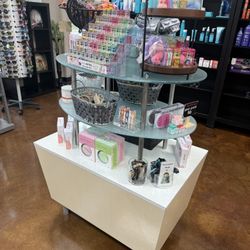 White And Glass Retail Table