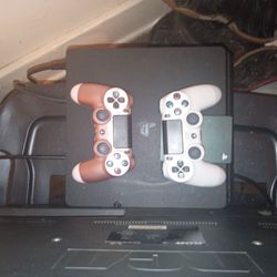 PlayStation 4 comes with 2 controllers,2tb hard drive, games, and cooling fan