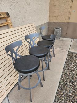 Set of 4 high top stools.