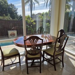 Niagara Mahogany Round to Oval Dining Table and Chairs