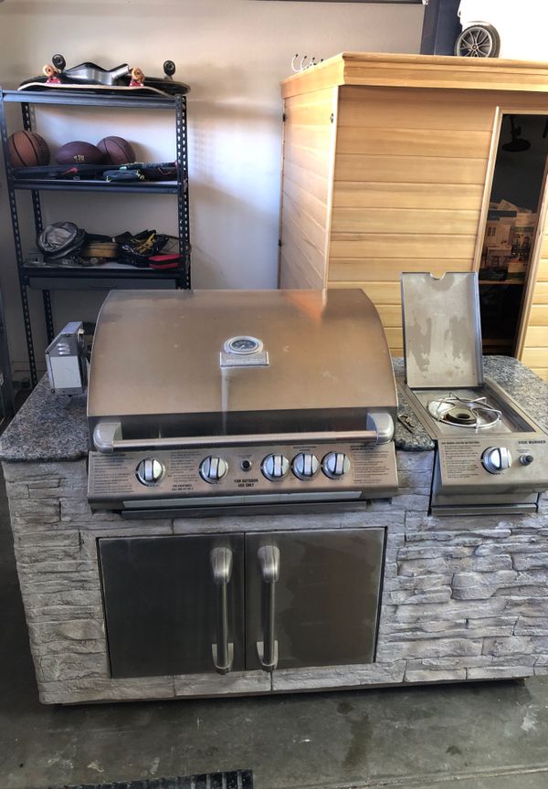 Charmglow gourmet series grill with electric rotisserie and side burner