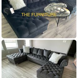 BLACK SECTIONAL WITH ACCENT PILLOWS AND CHROME LEGS 