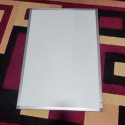 White Board, Strong, Not Heavy, Easy To Erase. 