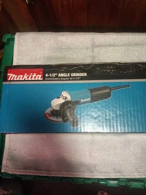New Makita 4  1/2 SJS High Powered Grinder With Paddle Switch For Sale.