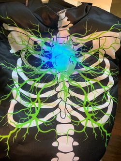 Halloween costumes skeleton with beating heart