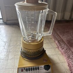 This is a vintage Hoover Company blender model K6003 circa 1972. The retro kitchen blender features 6 speed solid state blending as well as a manual p