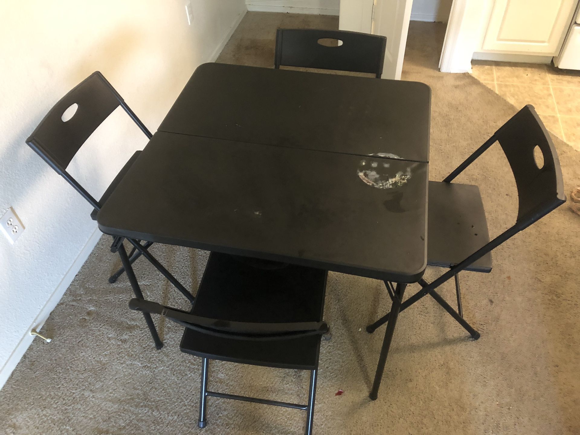 Foldable dining table and 4 chairs