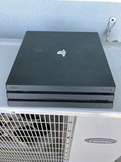PS4 Pro 1TB Console with Controller