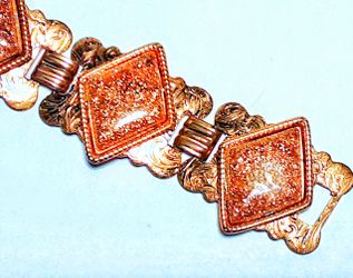 Vintage costume jewelry bracelet copper finish with faux coppery goldstone thermoset diamond inlays