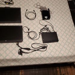 2 Monitors A Wii A Blue Ray Player (With Cords) And An Adapter For X Box Ps4 And Wii And 3 Hdmi Cables 