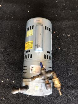 Electric motor with pump