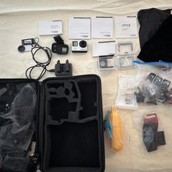 Go Pro Hero 4 Silver & Accessory Bundle 