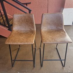 Two Faux Leather Barstools